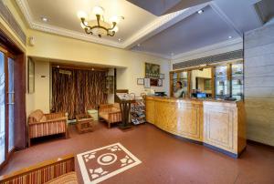 Posezení v ubytování Ramee Guestline Hotel Khar