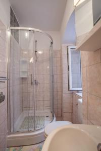 Koupelna v ubytování Apartments Dabović