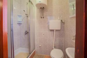 Koupelna v ubytování Apartments Dabović