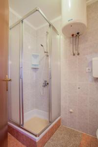 Koupelna v ubytování Apartments Dabović
