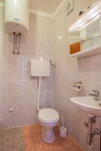 Koupelna v ubytování Apartments Dabović