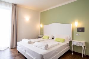 Postel nebo postele na pokoji v ubytování Hotel Speranza