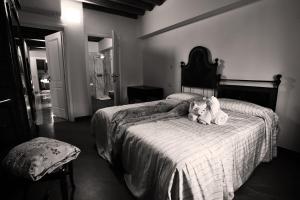 Ліжко або ліжка в номері Agriturismo Tenuta Casteldardo
