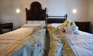 A bed or beds in a room at Agriturismo Tenuta Casteldardo