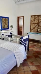 Letto o letti in una camera di A 50 passi dal Tempio di Apollo
