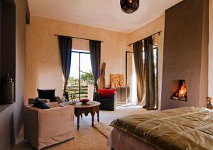Ένα ή περισσότερα κρεβάτια σε δωμάτιο στο The Capaldi Hotel, Restaurant & Spa