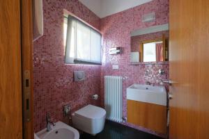 Ванная комната в Albergo Milano