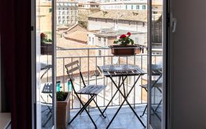 A balcony or terrace at Top Floor Trastevere