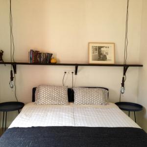 Ένα ή περισσότερα κρεβάτια σε δωμάτιο στο village loft
