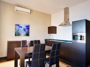 Una cocina o zona de cocina en Occidental Pueblo Acantilado