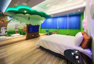 Postel nebo postele na pokoji v ubytování Chen He Motel