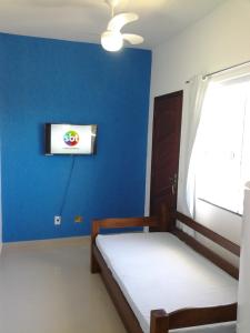 A bed or beds in a room at Caribe Brasileiro