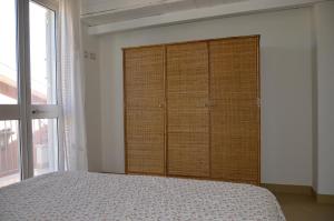 A bed or beds in a room at residence scala dei turchi