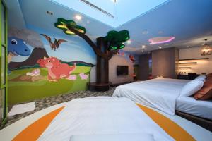 Postel nebo postele na pokoji v ubytování Chen He Motel