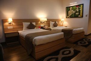 Ana Clarks Inn, Panchkula客房内的一张或多张床位
