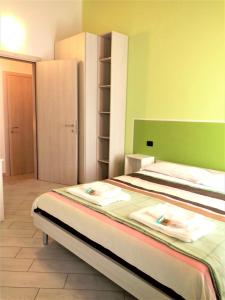 Postel nebo postele na pokoji v ubytování B&B Bianchi 64