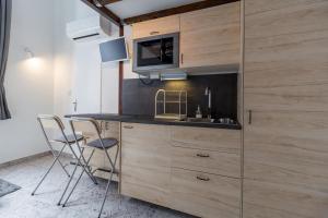 Kuchyňa alebo kuchynka v ubytovaní Flexible SelfCheckIns 13 & 14 - Le Petit & Le Grand Zagreb - Centre - New - Apartments Repinc