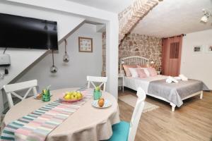 Posteľ alebo postele v izbe v ubytovaní Cozy Apartment MARÌ