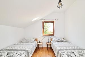 Posteľ alebo postele v izbe v ubytovaní Vila Radini + 21 fotografií