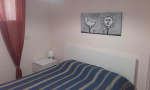 A bed or beds in a room at B&B la Palma