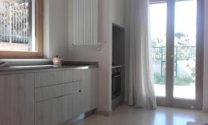 A kitchen or kitchenette at B&B la Palma