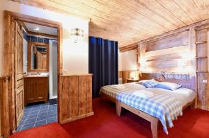 Tempat tidur dalam kamar di Ancolies Val Thorens