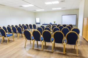 Área de negócios e/ou sala de conferências em Hotel Black Tulip - Porto Gaia