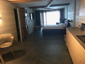 Rúm í herbergi á Charly Studio In Gstaad