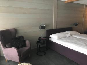 Rúm í herbergi á Charly Studio In Gstaad