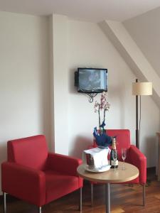 A television and/or entertainment centre at Hotel Ril