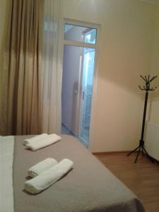 Postel nebo postele na pokoji v ubytování Gonio Apsaros House