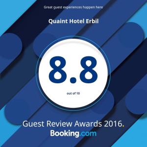un folleto para los premios de revisión de invitados con el número ocho en Quaint Hotel Erbil en Erbil