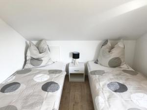 Ένα ή περισσότερα κρεβάτια σε δωμάτιο στο Zollernalb-Apartment