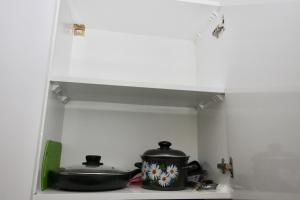 Kuchyň nebo kuchyňský kout v ubytování Apartment N322 Gudauri Loft