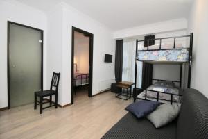 Postel nebo postele na pokoji v ubytování Apartment N322 Gudauri Loft + 37 fotografií