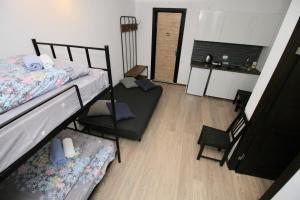 Postel nebo postele na pokoji v ubytování Apartment N322 Gudauri Loft