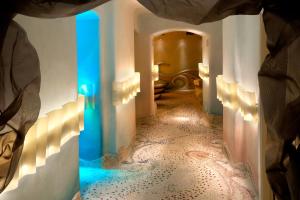 a hallway with a blue light in a building at Grand Hotel Savoia in Genoa