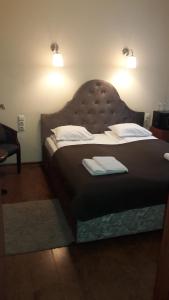 Postel nebo postele na pokoji v ubytování Taurus Apartments Vilnius