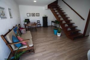 Area tempat duduk di Casa d'Avó Guesthouse and Apartment