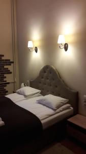 Postel nebo postele na pokoji v ubytování Taurus Apartments Vilnius