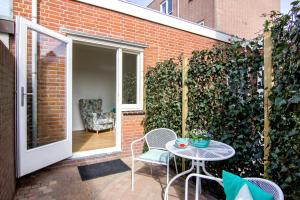 Patio nebo venkovní prostory v ubytování Lou-Lou