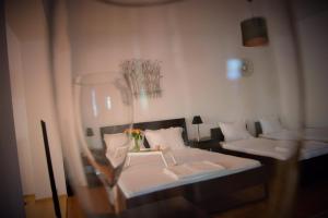 Postel nebo postele na pokoji v ubytování Casa Rendez Vous