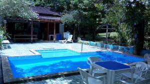 Der Swimmingpool an oder in der Nähe von Amazon Hostel & Eventos