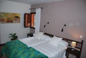 Posteľ alebo postele v izbe v ubytovaní Hotel Rural Don Burguillo
