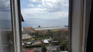 a view of a city from a window at Apartment Sandi in Rijeka