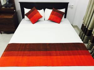 מיטה או מיטות בחדר ב-Sunhill Lake Tourist Rest