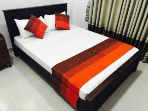 Letto o letti in una camera di Sunhill Lake Tourist Rest