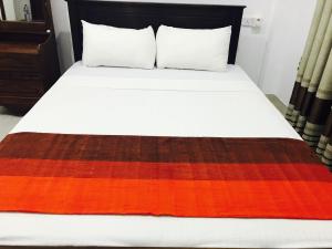 Letto o letti in una camera di Sunhill Lake Tourist Rest