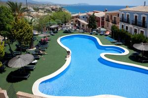 Piscina en o cerca de Occidental Pueblo Acantilado