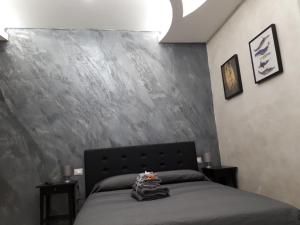 Łóżko lub łóżka w pokoju w obiekcie Silver house